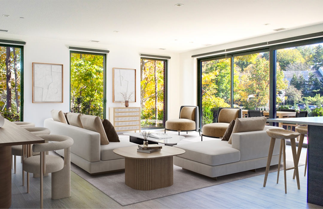 A modern living room with big windows letting in lots of natural light